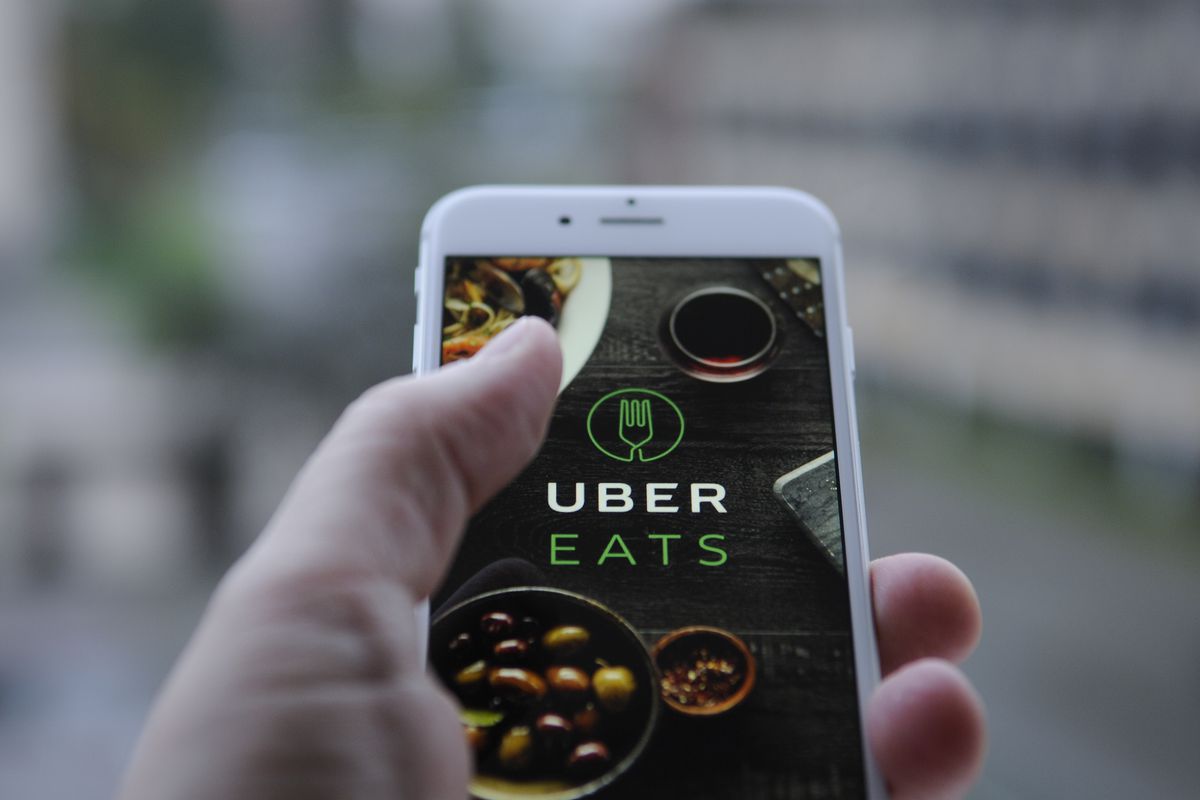 Uber Eats digital out-of-home advertising campaign displayed outdoors