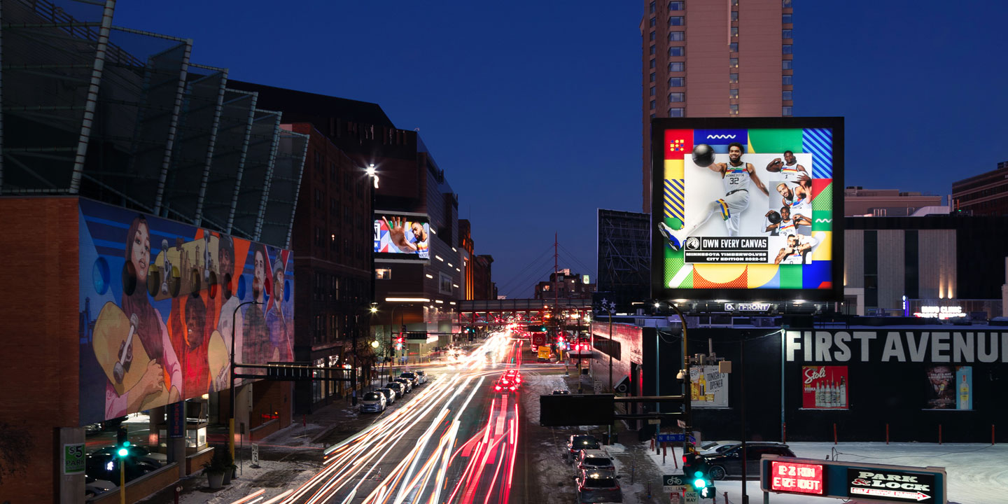 Urban street scene in Minneapolis with outdoor advertising displays