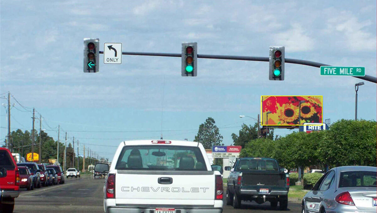 Digital out-of-home billboard displayed along a roadway in Idaho