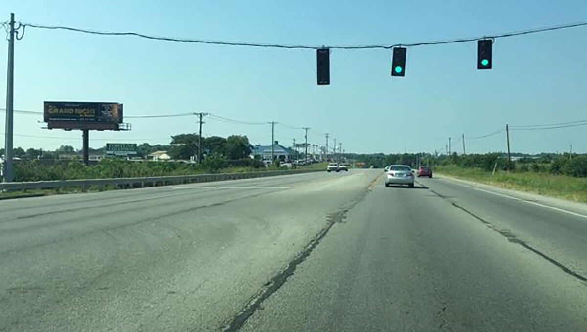 Digital out-of-home billboard displayed along a roadway in Kentucky
